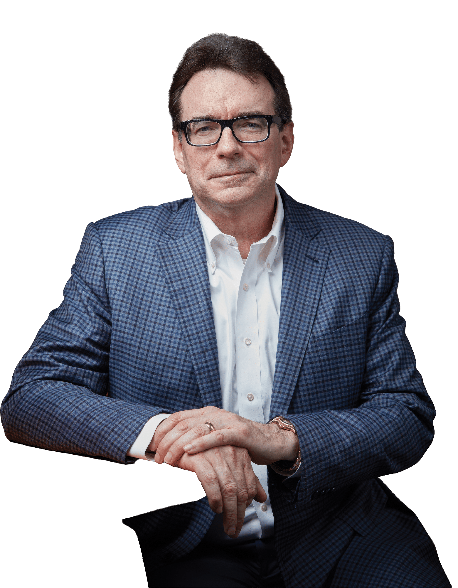 A man wearing a suit and glasses. Description generated by AI