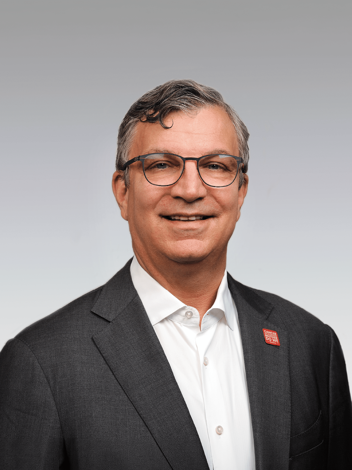 A man wearing a suit and tie. Description generated by AI